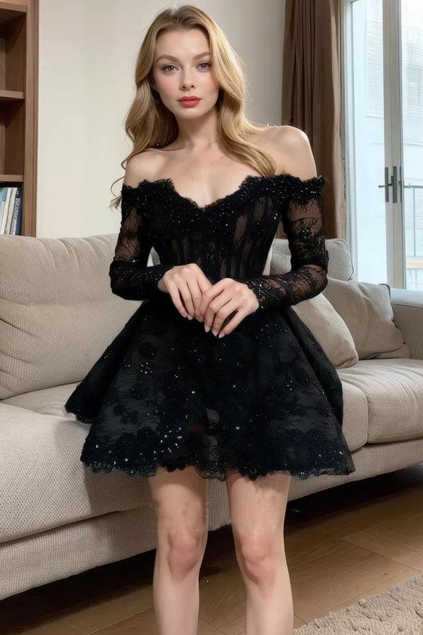 Vestido de fiesta negro de manga larga con hombros descubiertos y cuentas