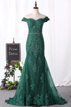 Vestidos de fiesta de sirena con hombros descubiertos de tul con apliques y cuentas