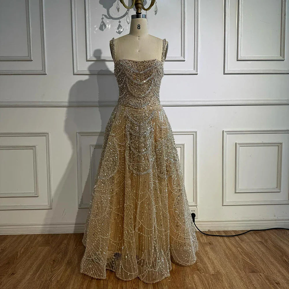 Vestido de noche de lujo estilo A con perlas y cristales