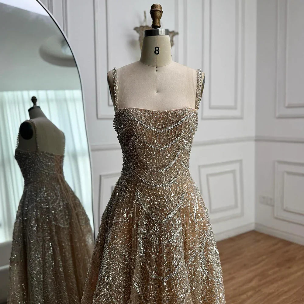 Vestido de noche de lujo estilo A con perlas y cristales