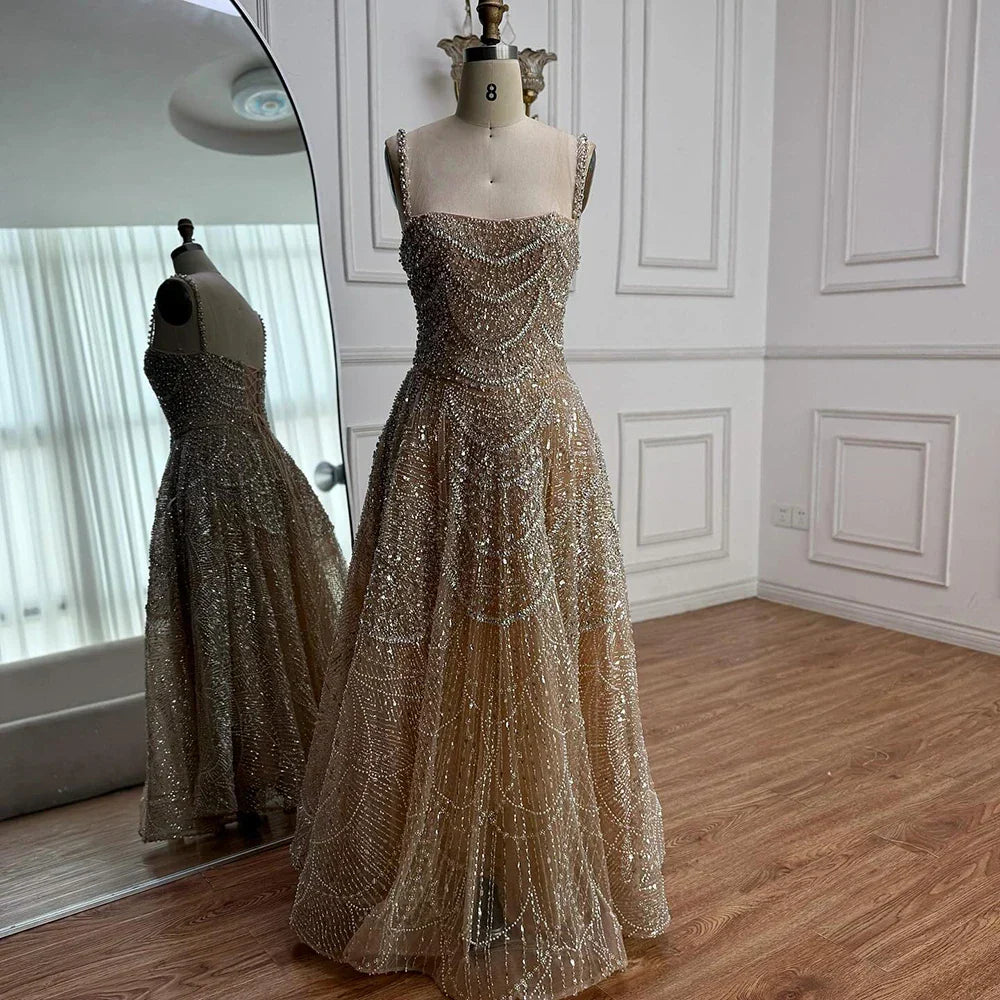 Vestido de noche de lujo estilo A con perlas y cristales