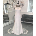 Vestido de novia vintage para mujer, de corte bajo, manga casquillo, con cola y sirena, color blanco, NumberSea