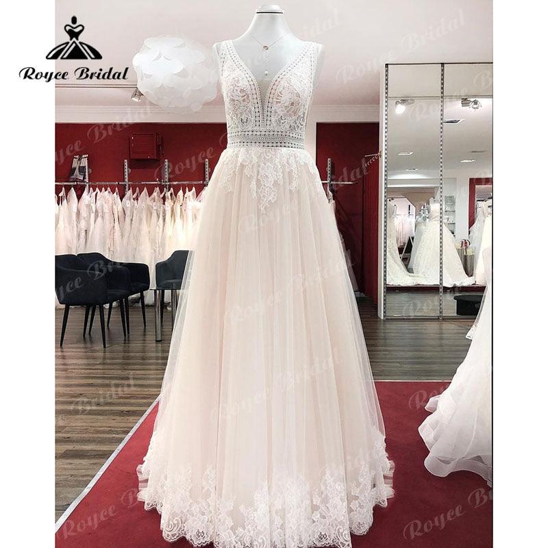 Vestido de novia vintage bohemio color champán con apliques de encaje, escote en V, sin mangas, cola larga, para playa, 2022, elegante, estilo civil.