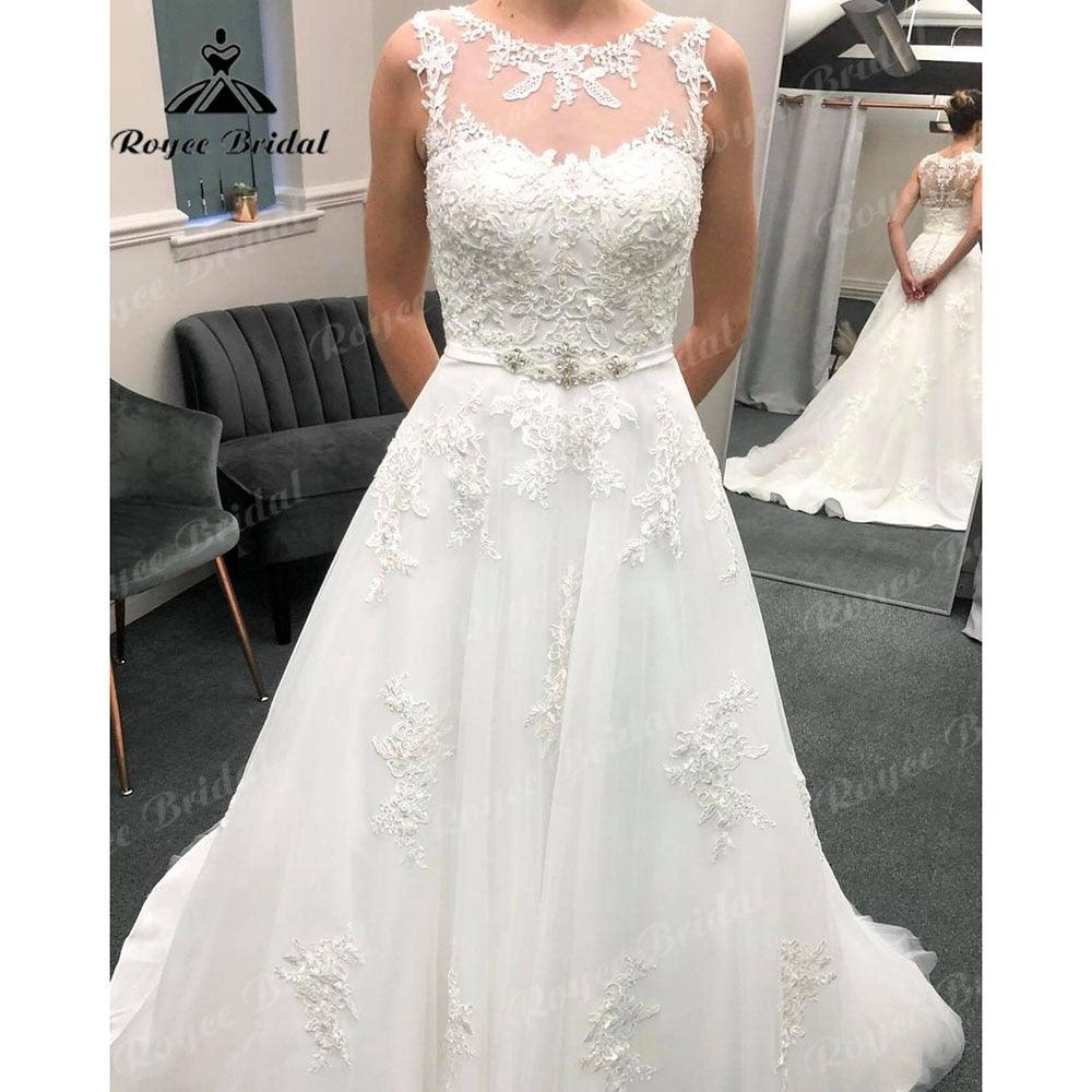 Vestido de novia vintage de encaje con apliques, sin mangas y cinturón, espalda ilusión, 2024 