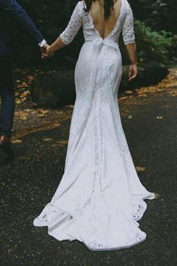 Vestido de novia NumberSea de encaje blanco, estilo sirena, con media manga y escote en V.