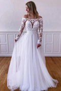 Vestidos de novia NumberSea de tul blanco con encaje, corte A y mangas largas.