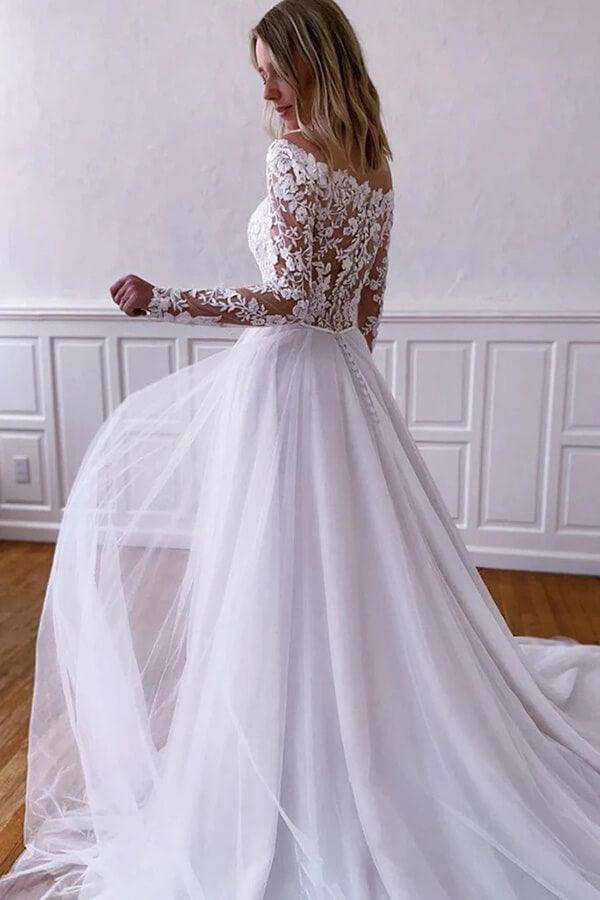 Vestidos de novia NumberSea de tul blanco con encaje, corte A y mangas largas.