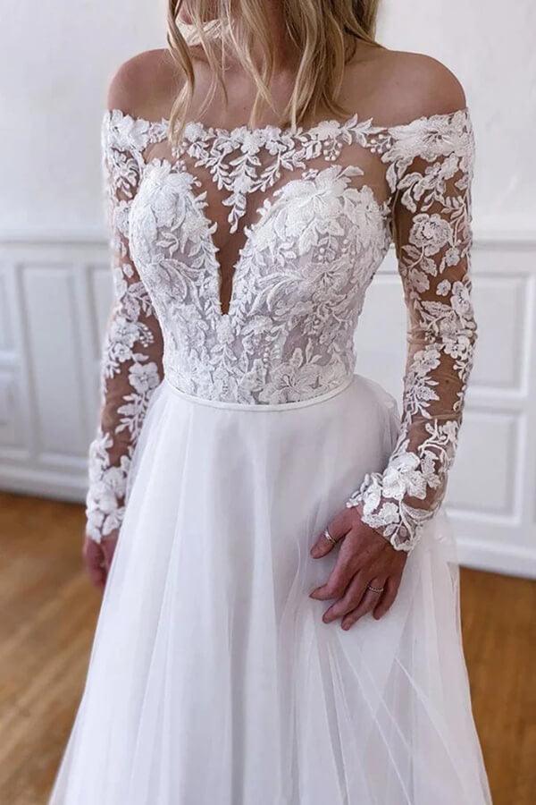 Vestidos de novia NumberSea de tul blanco con encaje, corte A y mangas largas.