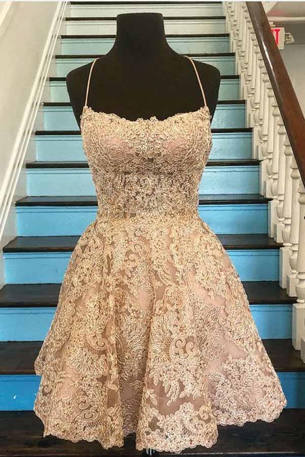 Kurzes, blaues Ballkleid aus Spitze in A-Linie mit Spaghettiträgern und gekreuztem Rücken