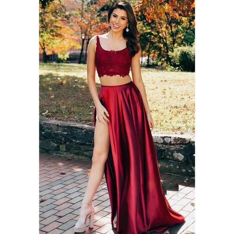 Burgunderrotes, zweiteiliges Ballkleid aus Satin mit Spitzenoberteil und Doppelträgern und Taschen 