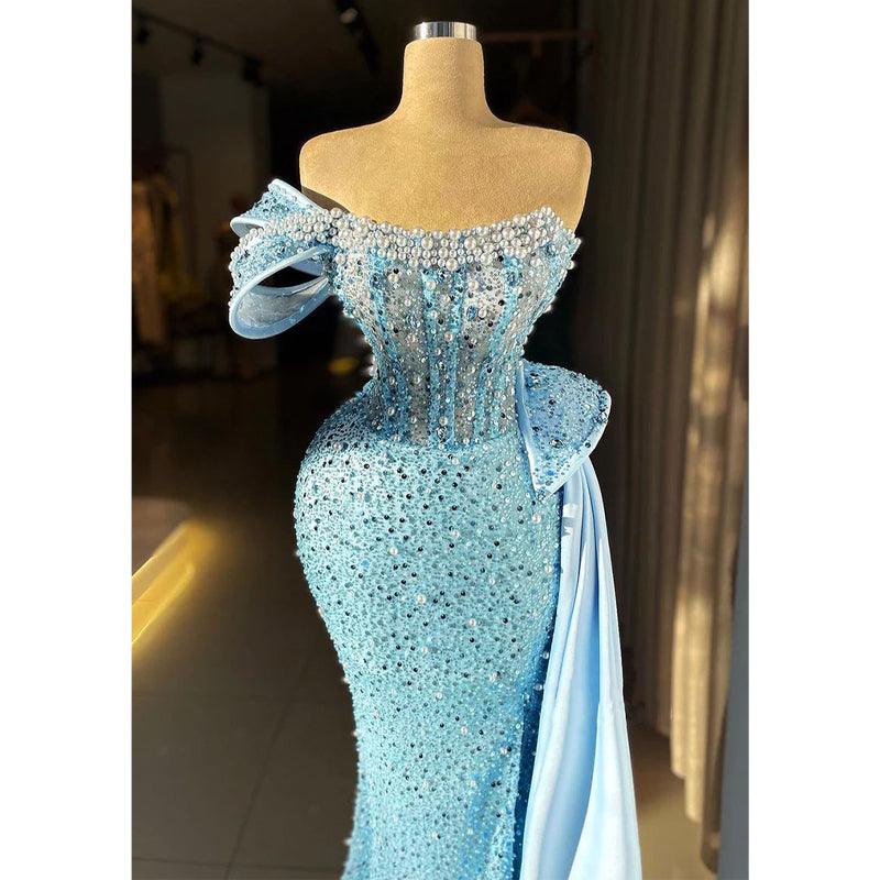 Elegante y lujoso vestido de fiesta azul de un solo hombro con bordado de cuentas 