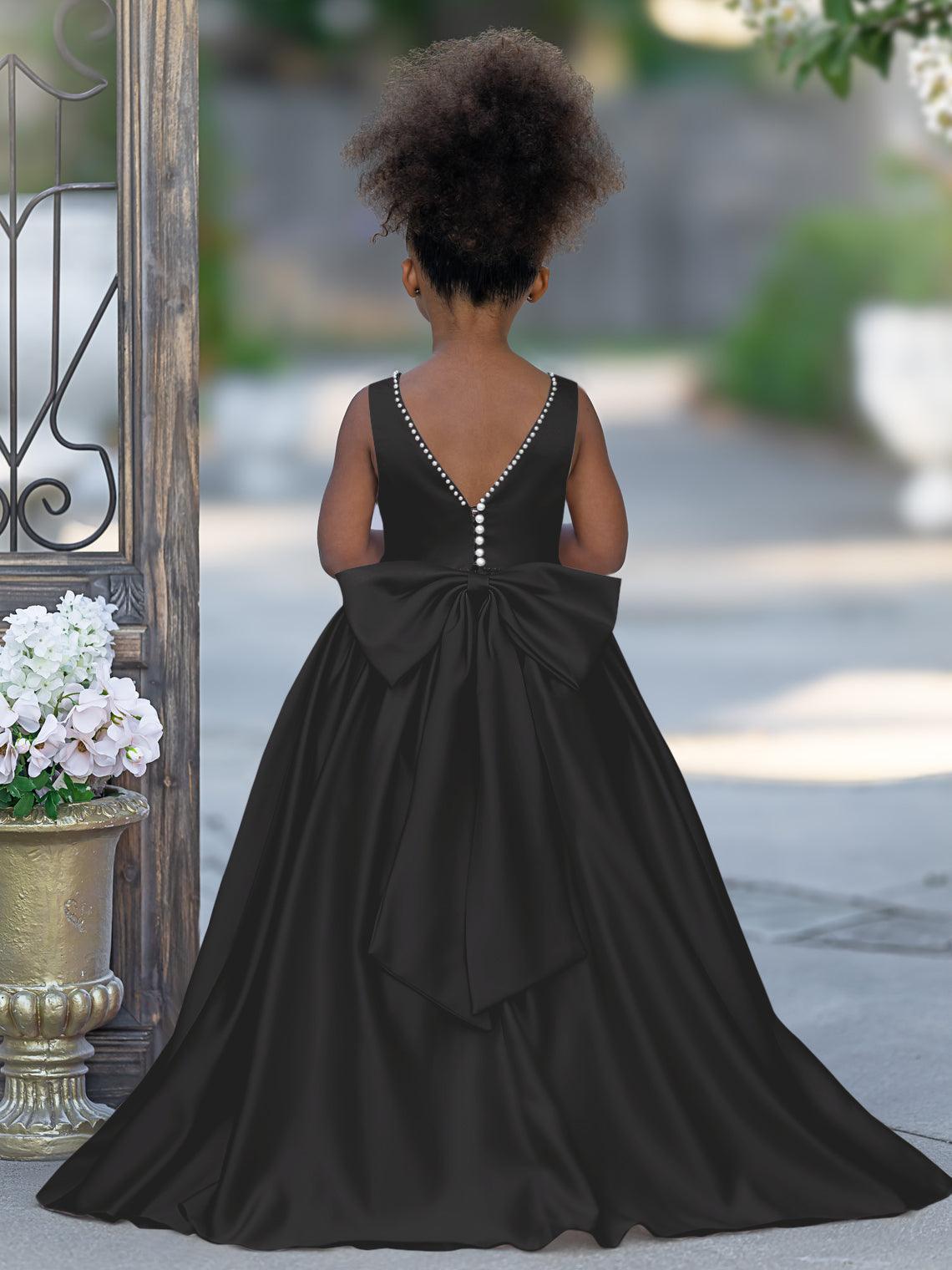 Vestido rosa sin mangas de satén con escote de cuentas y detalle de lazo 