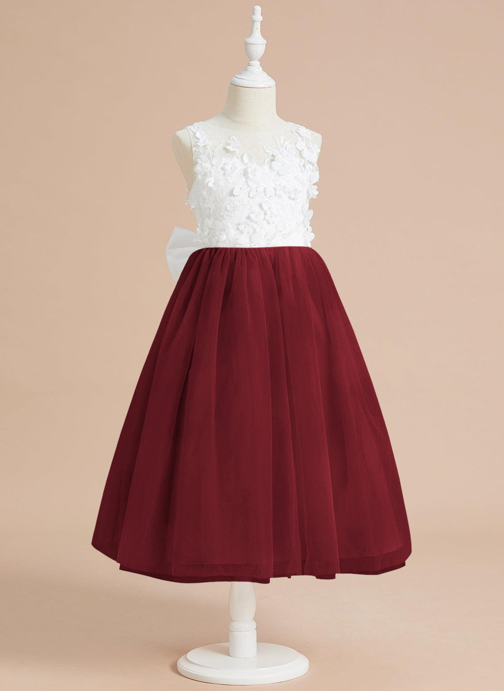 Vestido largo hasta la rodilla con encaje floral y lazo grande 