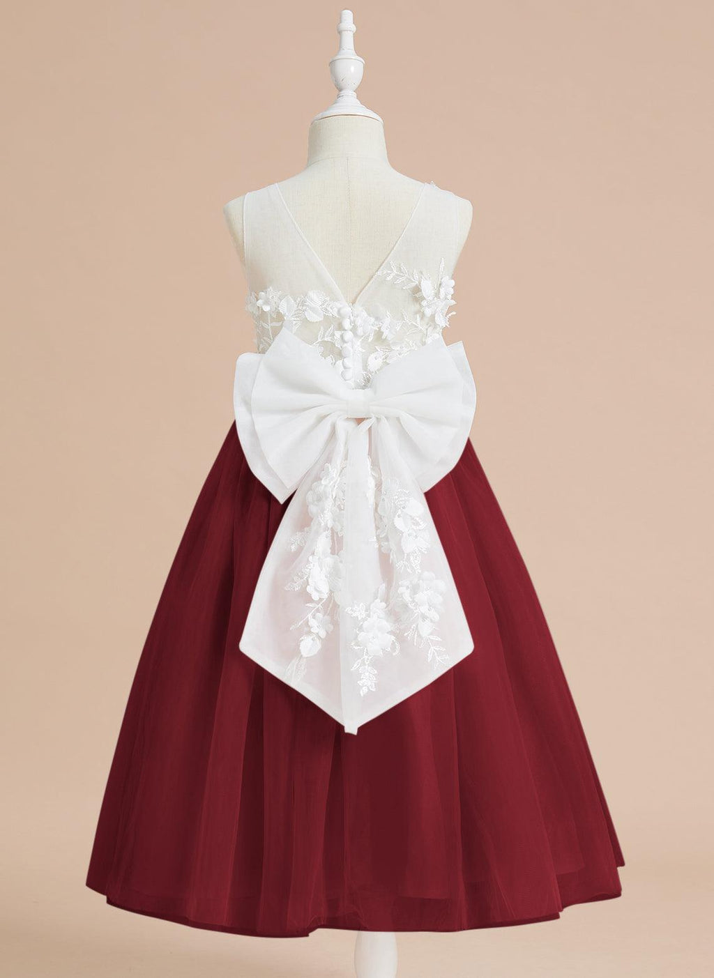 Vestido largo hasta la rodilla con encaje floral y lazo grande 