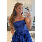 Vestido de fiesta largo de corte A con apliques de lentejuelas y bolsillos, sin tirantes
