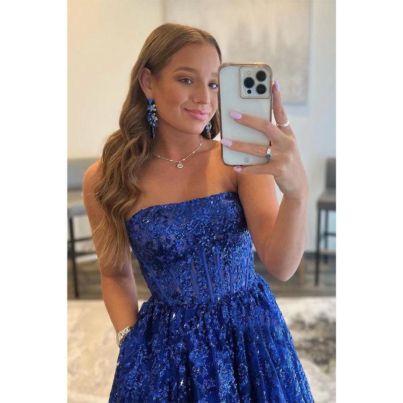 Vestido de fiesta largo de corte A con apliques de lentejuelas y bolsillos, sin tirantes
