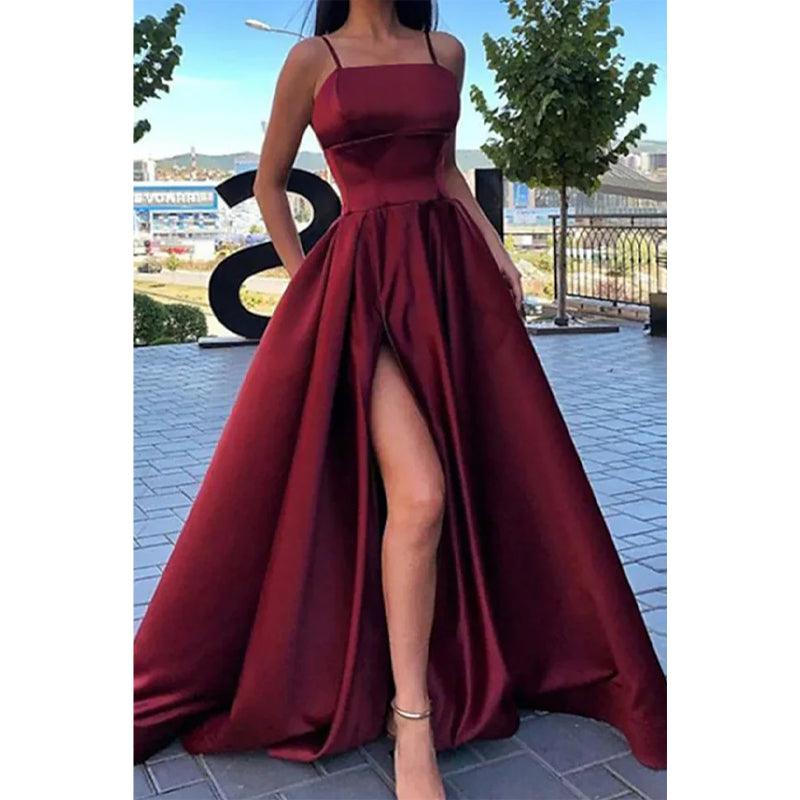 Vestido de fiesta largo con tirantes finos, escote barco y abertura alta con bolsillos