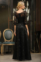 Charmantes schwarzes Abendkleid mit halblangen Ärmeln und Tüll-Pailletten im 20er-Jahre-Aline-Stil