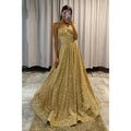 Vestido de fiesta dorado con tirantes finos y purpurina 