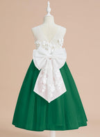 Wadenlanges Kleid aus floraler Spitze mit großer Schleife 