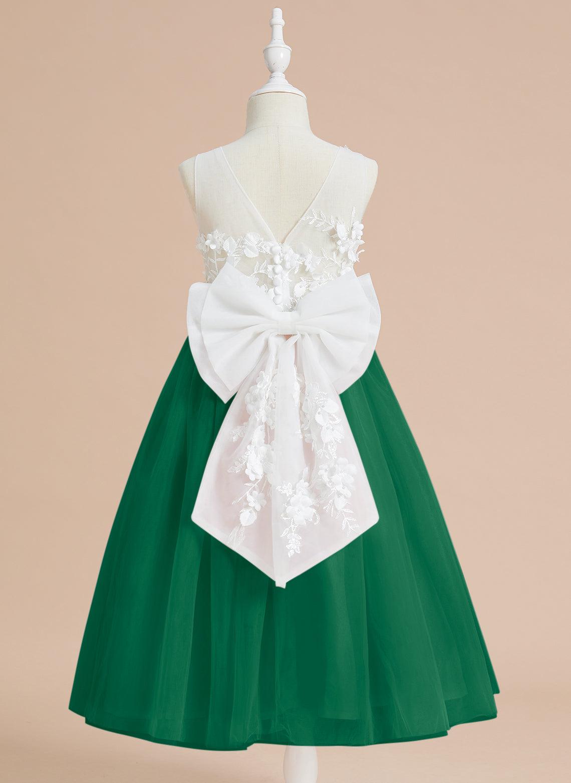 Wadenlanges Kleid aus floraler Spitze mit großer Schleife 