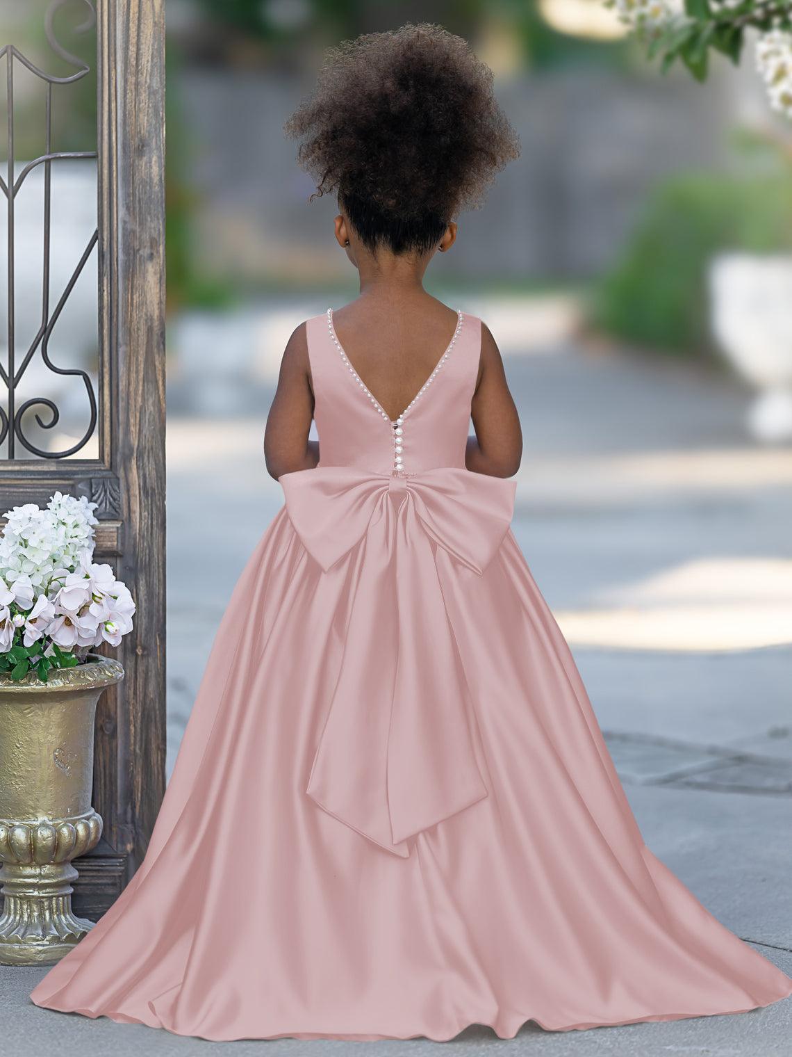 Vestido rosa sin mangas de satén con escote de cuentas y detalle de lazo 