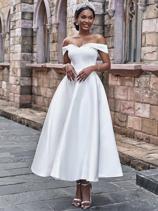 Vestidos de novia princesa satén volantes hombros descubiertos sin mangas largo