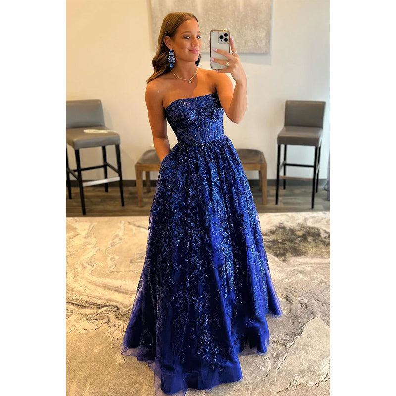 Vestido de fiesta largo de corte A con apliques de lentejuelas y bolsillos, sin tirantes