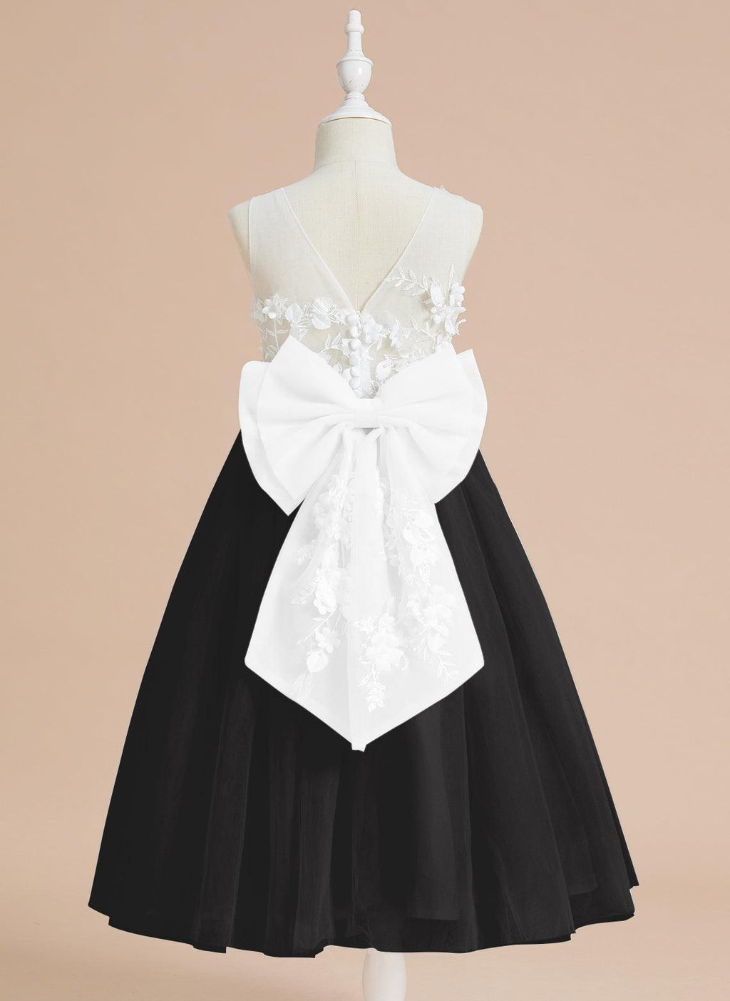 Vestido largo hasta la rodilla con encaje floral y lazo grande 