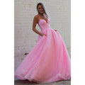 Vestido de fiesta rosa brillante con escote en V pronunciado y bolsillos 