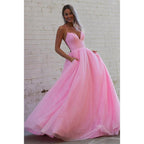 Vestido de fiesta rosa brillante con escote en V pronunciado y bolsillos 