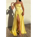 Vestido de fiesta largo de satén amarillo sin tirantes, con abertura alta y bolsillos 