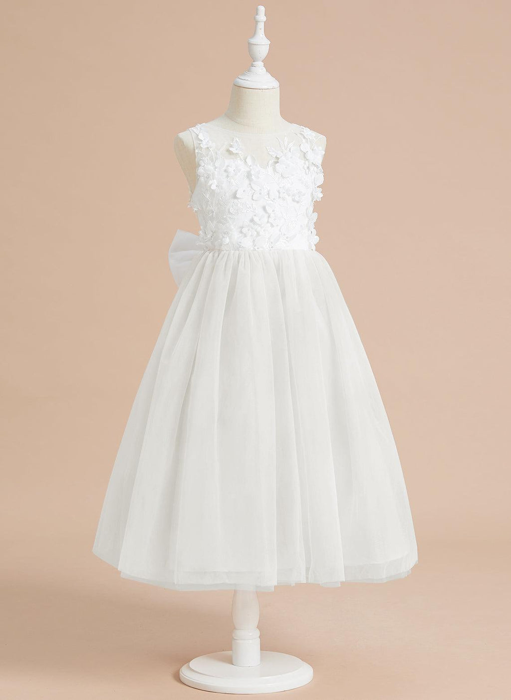 Vestido largo hasta la rodilla con encaje floral y lazo grande 