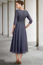 Hermoso vestido de madre de la novia de corte A con encaje, escote en V, mangas 3/4 y apliques para dama de honor.