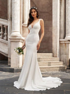 Vestido de novia de corte sirena/trompeta con escote en V, volantes, sin mangas y cola capilla