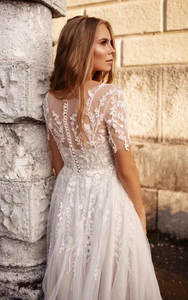 Vestido de novia largo hasta la rodilla, etéreo, moderno, corte A, escote en V, espalda con botones