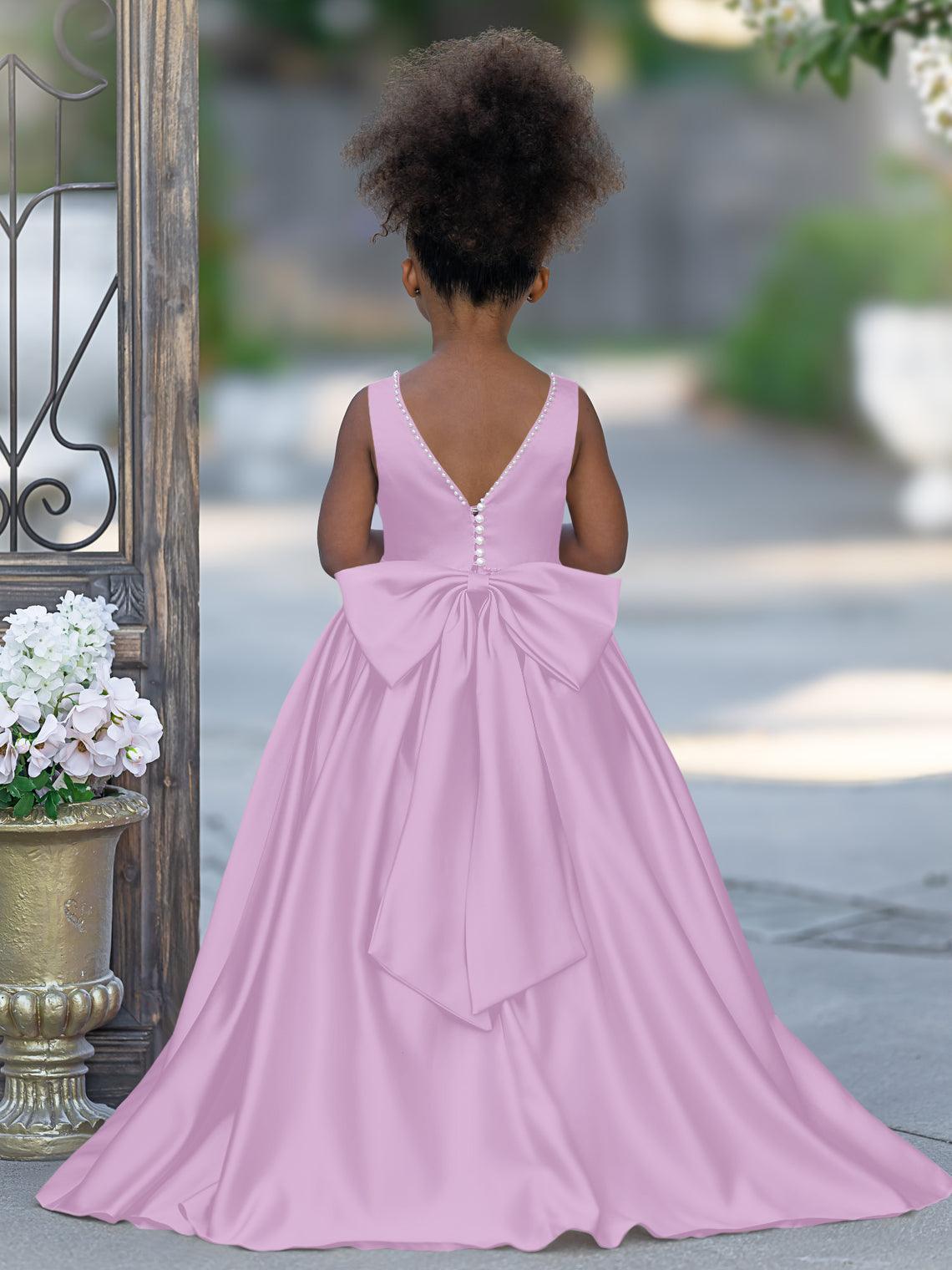 Vestido rosa sin mangas de satén con escote de cuentas y detalle de lazo 