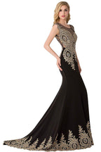 Vestido de noche de gasa con cola de sirena y apliques