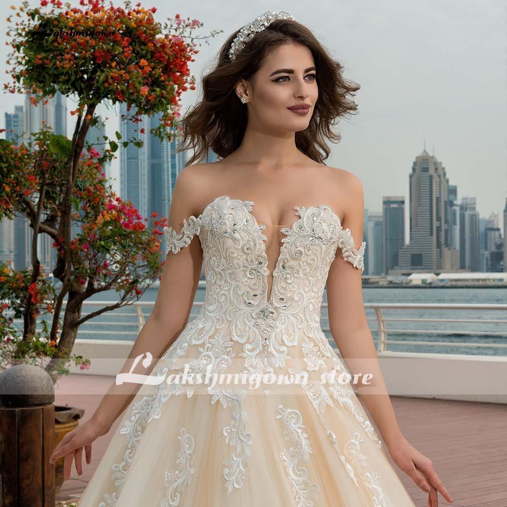 Vestidos de novia de encaje con hombros descubiertos y apliques de cuentas de NumberSea