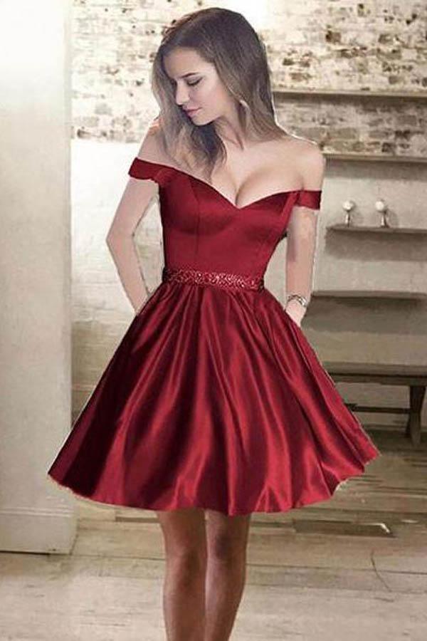 Vestidos de fiesta de satén con hombros descubiertos y cuentas, con bolsillo