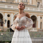Vestido de novia bohemio estilo princesa NumberSea con mangas abullonadas estilo playero