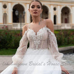 Vestido de novia bohemio estilo princesa NumberSea con mangas abullonadas estilo playero