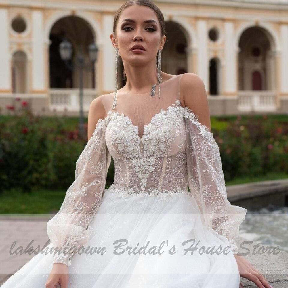 Vestido de novia bohemio estilo princesa NumberSea con mangas abullonadas estilo playero