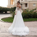 Vestido de novia bohemio estilo princesa NumberSea con mangas abullonadas estilo playero