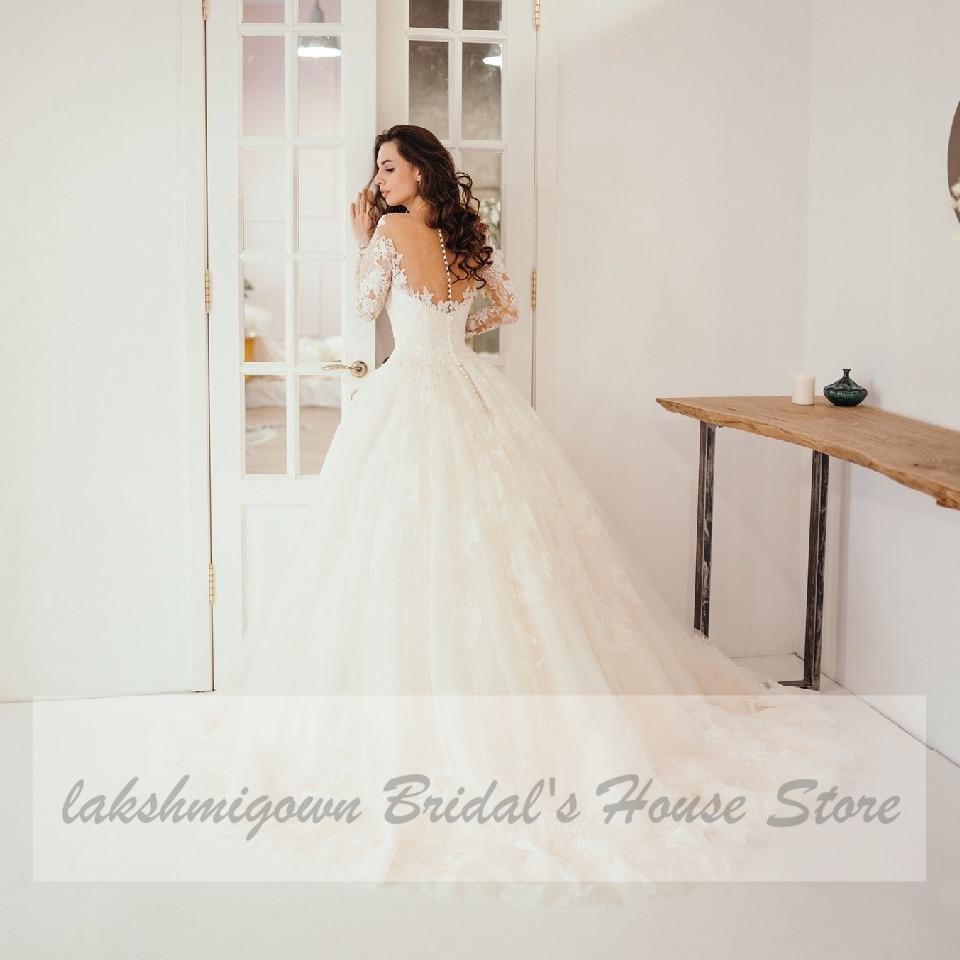 Vestido de novia de encaje estilo princesa NumberSea con mangas largas