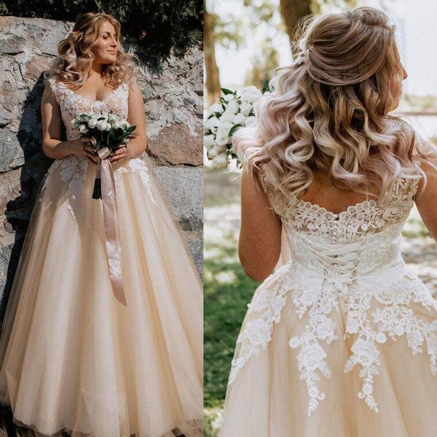 Vestido de novia largo elegante de corte A con escote en V, apliques de encaje y mangas cortas de NumberSea con perlas y cordones color champán