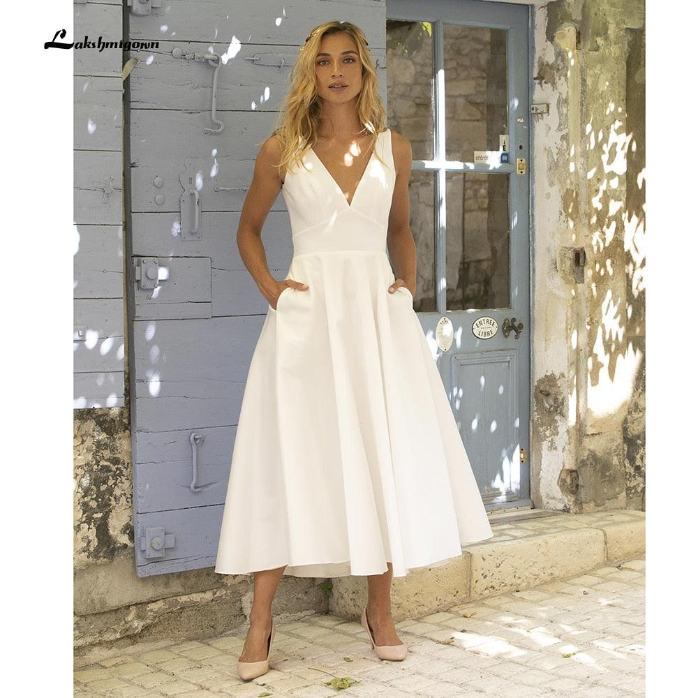 NumberSea Vestido de novia corto sencillo de satén con escote en V, largo hasta la rodilla, sin espalda y con bolsillo, para playa