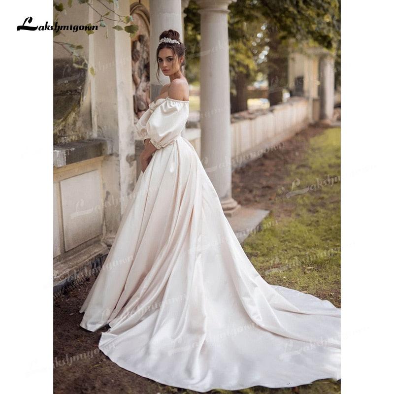 Vestidos de novia NumberSea de satén suave, corte A, escote corazón, media manga abullonada, corsé con cuentas, espalda abierta, cola capilla, plisado
