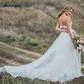 Vestidos de novia bohemios de dos piezas con tul, corte A, escote en V, tirantes finos, espalda descubierta, sin mangas, cola capilla, apliques y pliegues.