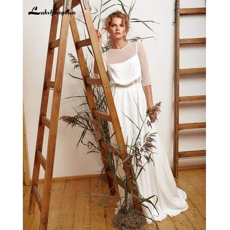 Vestido de novia blanco marfil con mangas abullonadas de NumberSea